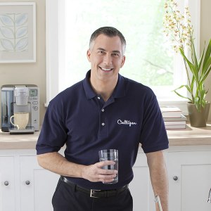 culligan water expert with glass of water culligan water expert with glass of water