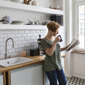 paymnt-square-kitchen-coffee woman enjoying coffee
