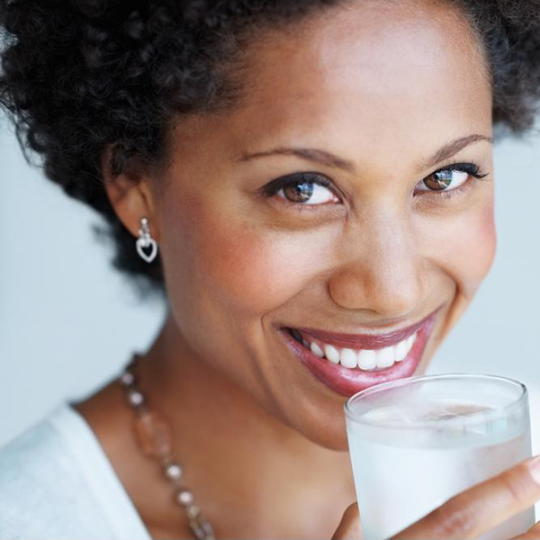 woman drinking glass of water