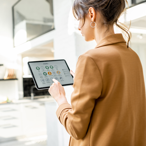 woman managing smart appliances for home